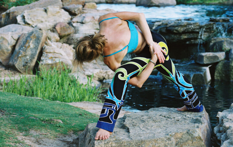 Forrest Yoga Intensive - Charmaine in Interlock yoga pose